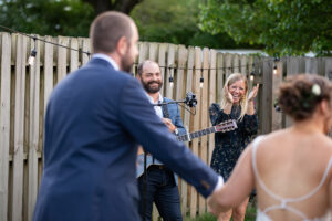 Drew & Ellie Holcomb Surprise Wedding Serenade Drew And Ellie Holcomb Performing Back View