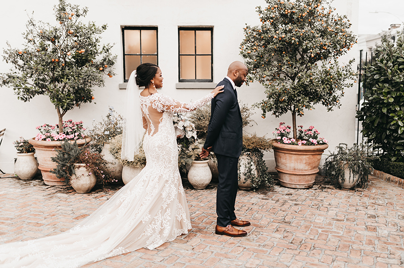 Why Couple Chose A New Orleans Destination Wedding Bride Hand On Back (1)