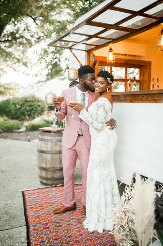 Memphis Metal Museum Styled Wedding Features Fall Boho Vibes Bride And Groom Enjoying A Cocktail