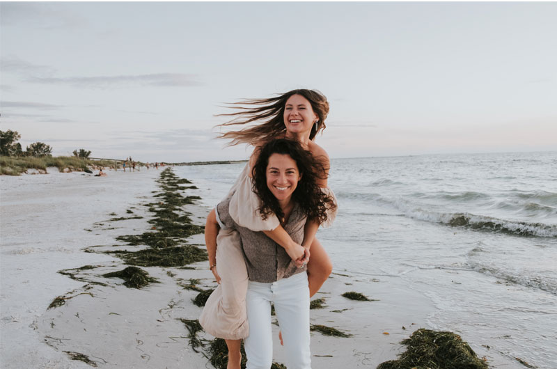 St Petersburg Florida Staycation Ends In Blissful Beachside Proposal Piggyback On Beach