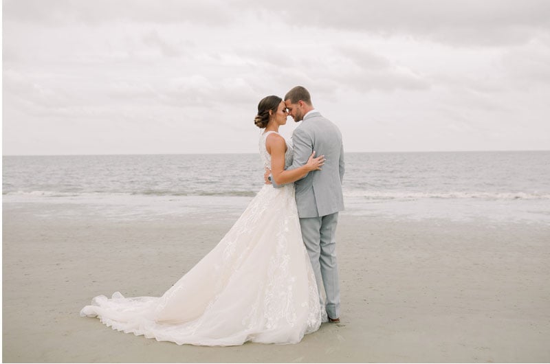 Westin Hilton Head Island Resort And Spa Offers Endless Options For Picturesque Destination Weddings Bride And Groom Embracing On The Beach Westin Hilton Head Island Resort And Spa Offers Endless Options For Picturesque Destination Weddings Bride And Groom Embracing On The Beach