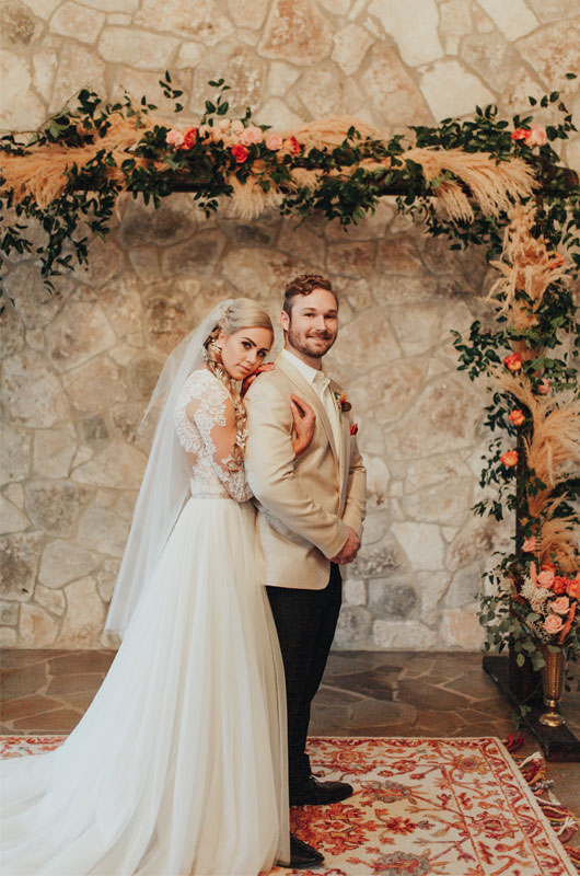 Styled Shoot Showcases A Fall, Rustic Indoor Wedding Venue Altar