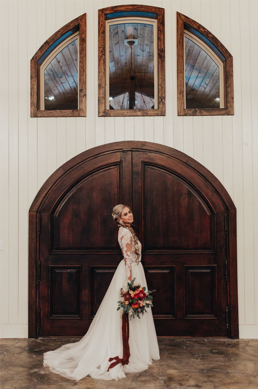 Styled Shoot Showcases A Fall, Rustic Indoor Wedding Venue Barn Door