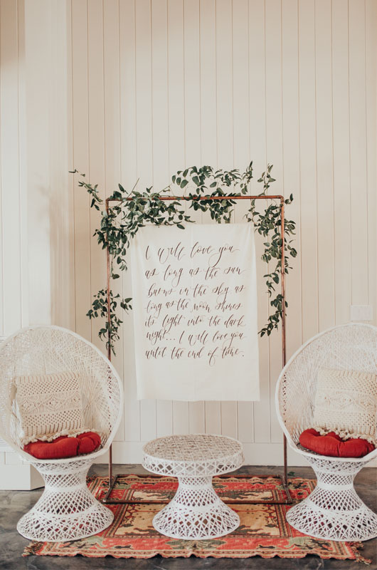 Styled Shoot Showcases A Fall, Rustic Indoor Wedding Venue Wicker Chairs