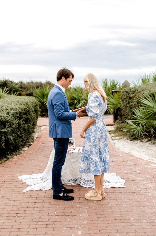 Kara And Chadwick’s Sunny Rosemary Beach Engagement Chadwick Putting The Ring On