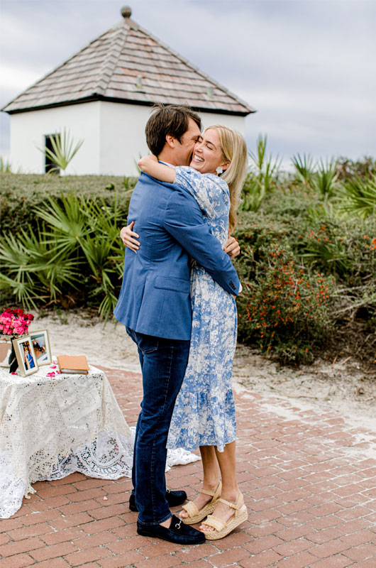 Kara And Chadwick’s Sunny Rosemary Beach Engagement Couple Hugging