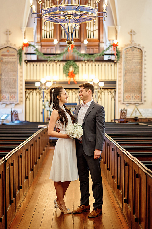 South Carolina Couple Postpones Big Wedding For A Christmas Elopement Bride And Groom Inside Church
