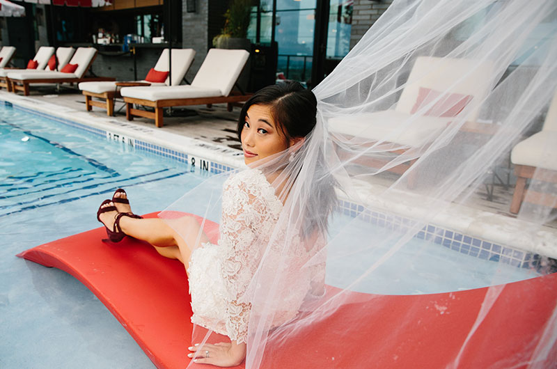 Virgin Hotel Styled Shoot In Southern Bride Magazine's Winter 2021 Issue Poolside With Veil