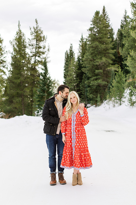 Callie And Kyle’s Colorado Mountainside Engagement Couple Embracing