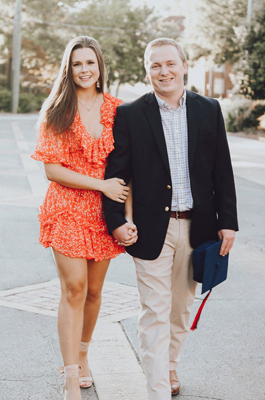 Oxford Mississippi College Sweetheart Photoshoot Proposal Standing With Graduation Cap