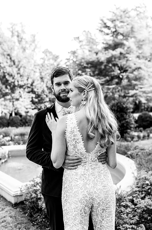 A Contemporary Chic Elopement At The Reynolda House Museum Of American Art Couple With Back Of Jumpsuit