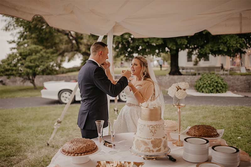 Bethany And Dakota Caudill Celebrate An Outdoor Monticello Kentucky Wedding Reception Cake