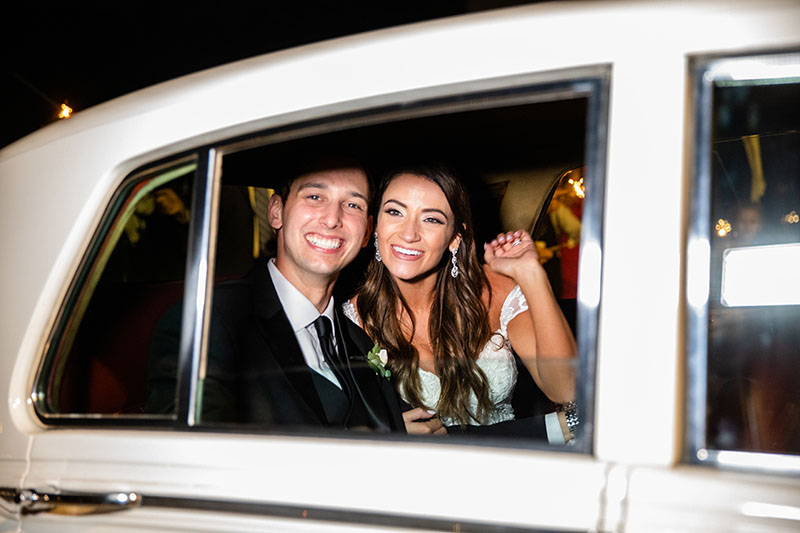 Brooke And Shane Moran Are The First Couple To Be Married At Boxwood Manor In Tomball, Texas Rolls Royce Getaway Car