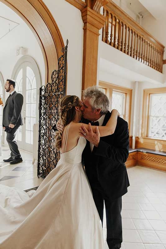 Ten Lighthearted Wedding Observations From The Father Of The Bride Hugging Father Of The Bride