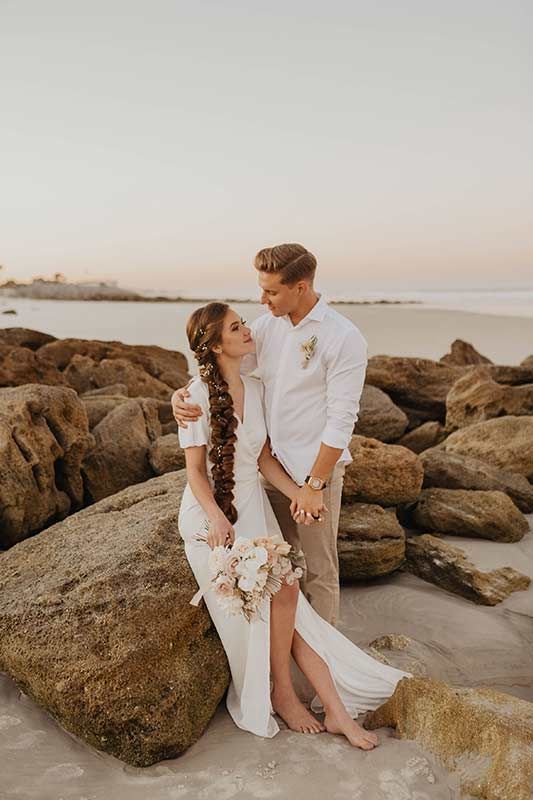 Rob And Roza Trachuk Celebrate Their Anniversary With An Elopement Styled Shoot In St Augustine Florida Holding Hands