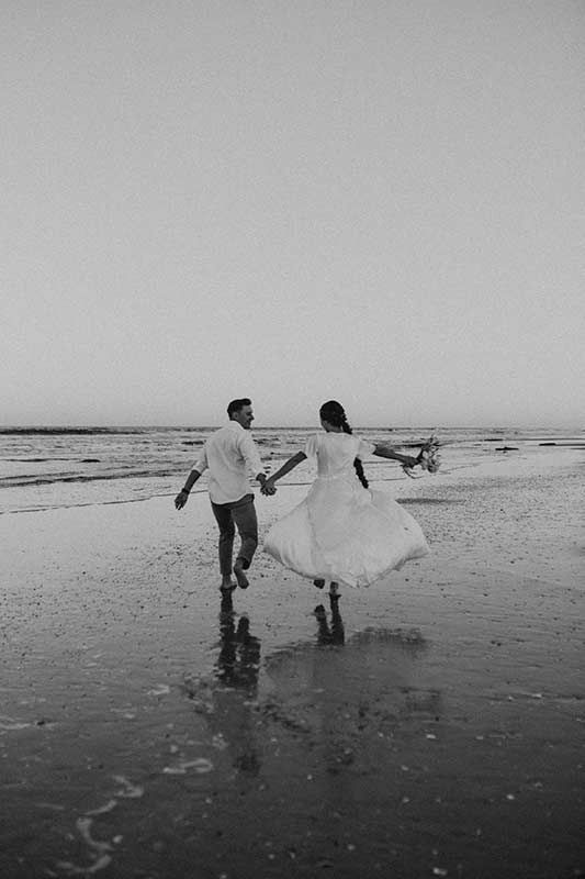 Rob And Roza Trachuk Celebrate Their Anniversary With An Elopement Styled Shoot In St Augustine Florida Running On Beach