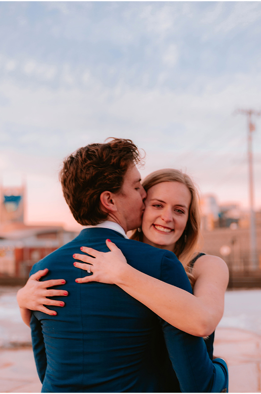 Zach Stone Nashville Artist Popped The Big Question Zach Kisses Becca While Hugging Copy