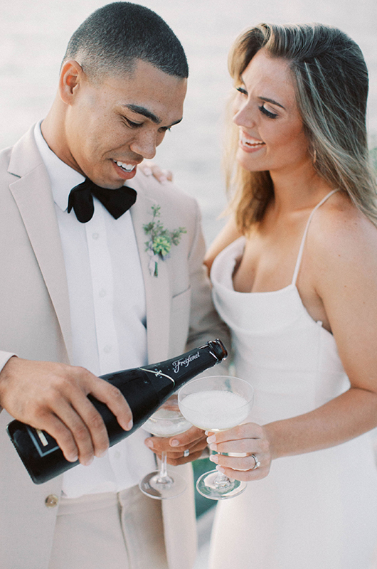 Sail Into The New Year With This Elopement Shoot On The Harbor Champagne
