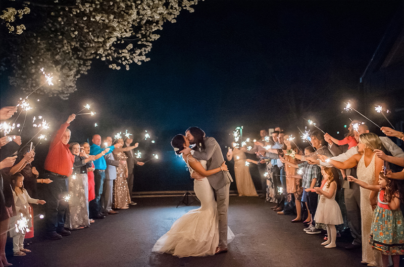 Lakepoint Restaurant And Event Center In Bella Vista Offers Breathtaking Backgrounds For Your Picturesque Dream Wedding Couple Kisses In Middle Of Dancefloor Copy