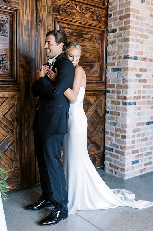 Carly Brown And J Paul Madison Marry At A Timeless Bryan Texas Vineyard Bride And Groom First Look Carly Brown And J Paul Madison Marry At A Timeless Bryan Texas Vineyard Bride And Groom First Look