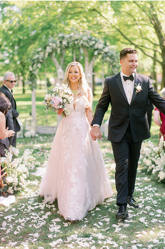Molly Rooney And Killian Woodward Luxury Waterfront Wedding In Tennessee Bride And Groom Walking Down The Aisle