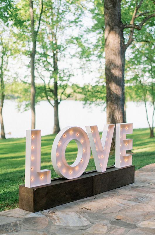 Molly Rooney And Killian Woodward Luxury Waterfront Wedding In Tennessee LOVE Light Up Sign