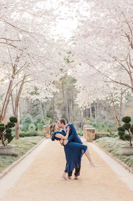 Kristin And Hunters Romantic Cherry Blossom Engagement Groom Kisses Bride Copy