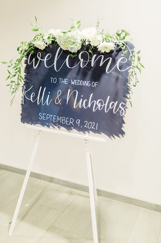 Kelli Mencke And Nicholas Janysek Wed On Lake Erie Welcome Sign