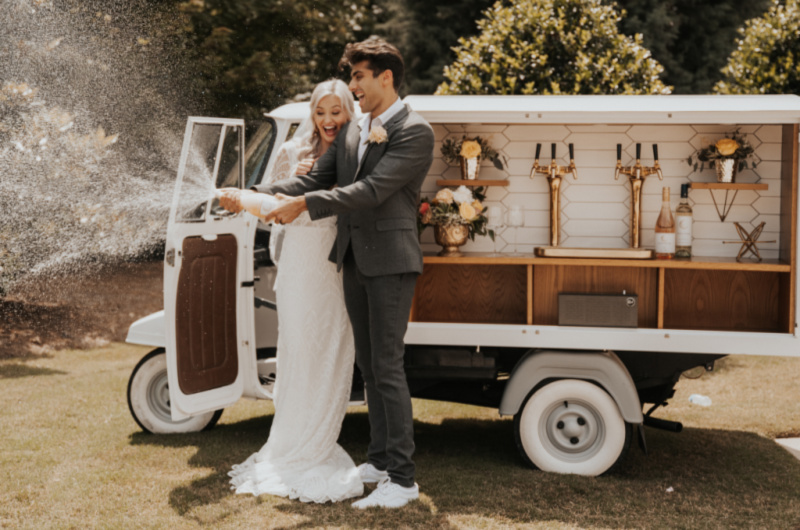 A Playful Romance Styled Shoot champagne truck