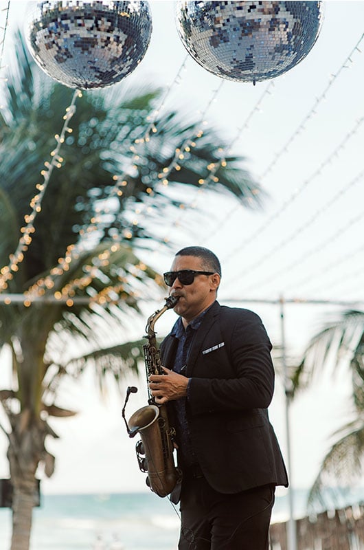 Alex Aust and Marcus Holman Marry at Akiin Tulum Saxophonist