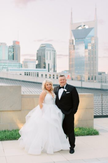 Kristen Byrne and Tyler Ohlmansieks Timess Wedding At the Country Music Hall of Fame In Nashville Tennessee Portrait Skyline
