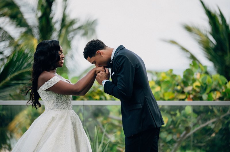 Shannon Phillips and Josh Hart Hand Kiss