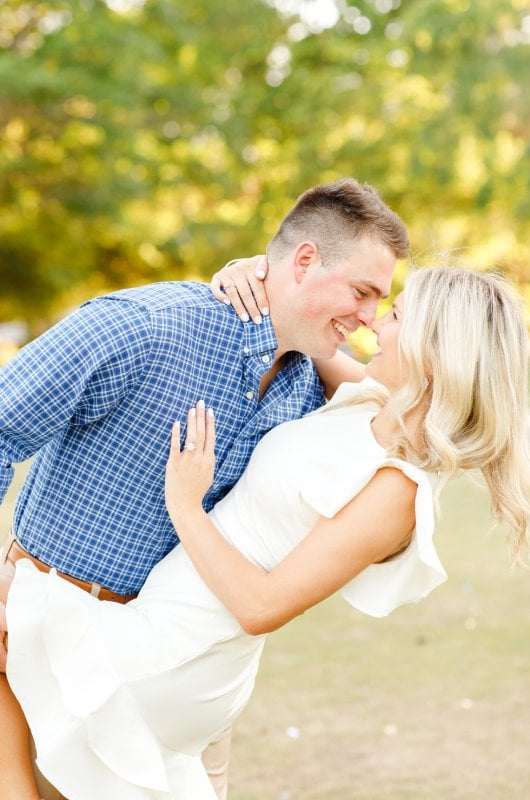 kayla and stuarts engagement at their alma mater propsal photo shoot