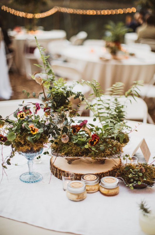 Elizabeth and Michael Marry at a Beautiful Fall Forest Wedding Reception Tables