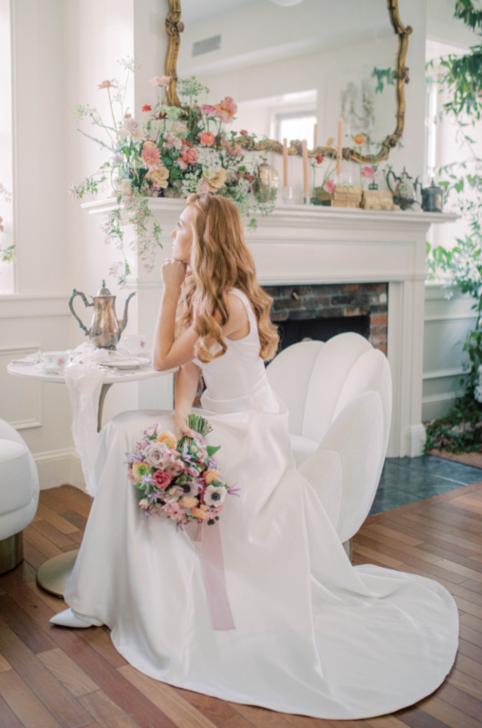 Tea Party Styled Wedding Shoot In Newburyport Massachusetts bride sitting