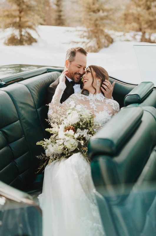 Jenny Tolman and Dave Brainard were married under the majestic Teton Mountain Range at Split Creek Ranch in Jackson Wyoming Car Portrait