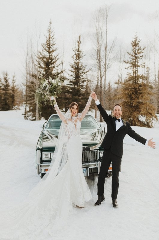 Jenny Tolman and Dave Brainard were married under the majestic Teton Mountain Range at Split Creek Ranch in Jackson Wyoming Car with hands up