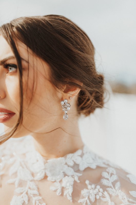 Jenny Tolman and Dave Brainard were married under the majestic Teton Mountain Range at Split Creek Ranch in Jackson Wyoming Earrings