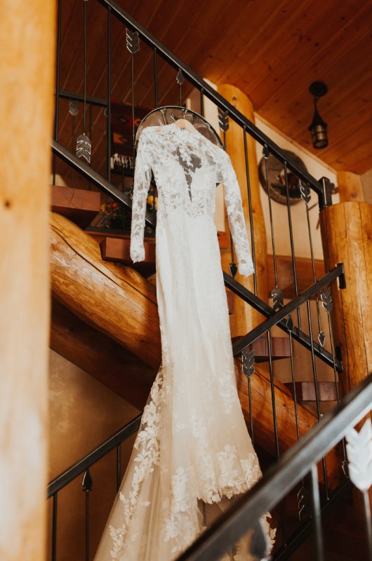 Jenny Tolman and Dave Brainard were married under the majestic Teton Mountain Range at Split Creek Ranch in Jackson Wyoming dress