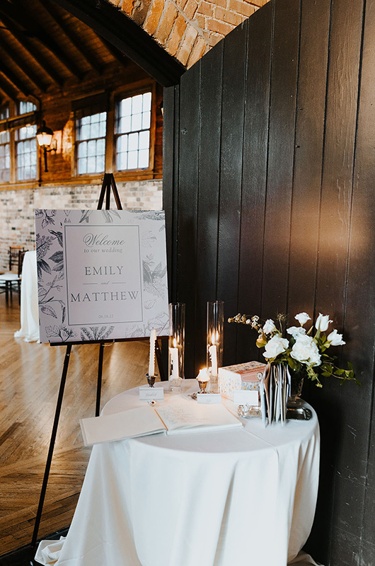 Emily and Matt Marry in a Classic Church Wedding with a Vintage Reception Welcome Sign