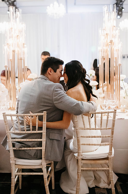 A Beautiful Ballroom Reception at the Four Seasons Hotel Minneapolis Bride and Groom at Reception