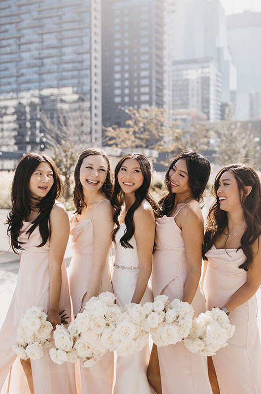 A Beautiful Ballroom Reception at the Four Seasons Hotel Minneapolis Bride with Bridesmaids on the Terrace