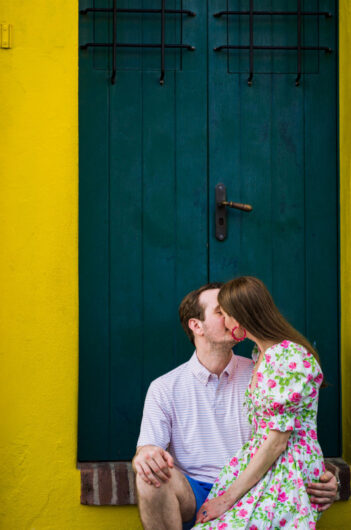 Lauren Junge And Austin Parker Engagement at the Condado Vanderbilt Hotel kiss green door
