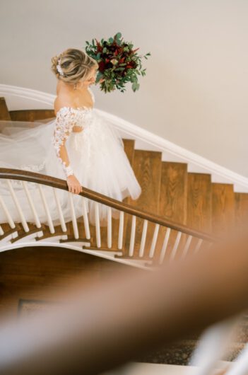 Alex Peele and Michael Oates Wedding in Brentwood Tennessee Overhead Bride Stairs