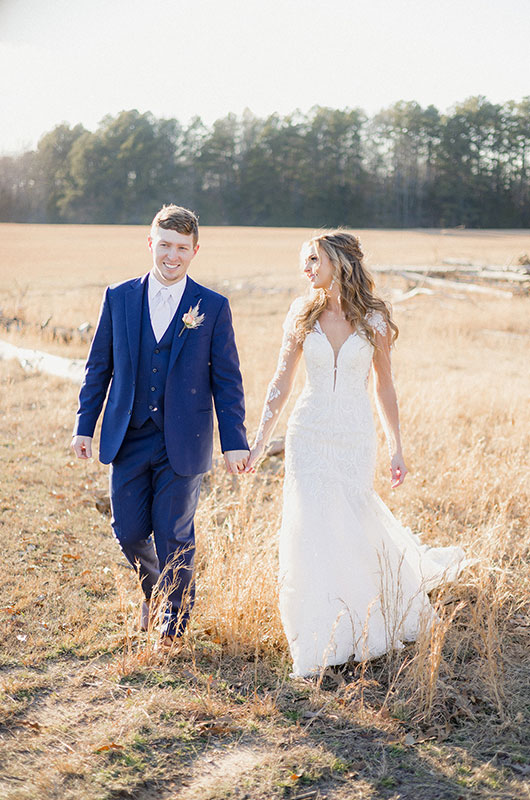 Ashton Williams and Tyler Zuber Marry at Fawn Hollow in Quitman Arkansas Bride and Groom Walking