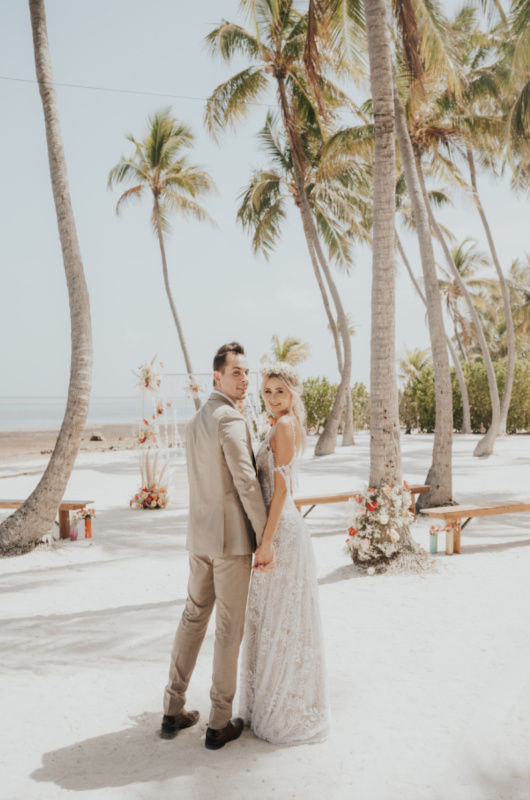 Casitas Beach Chicca Lodge Styled By Southern Bride couple turning back