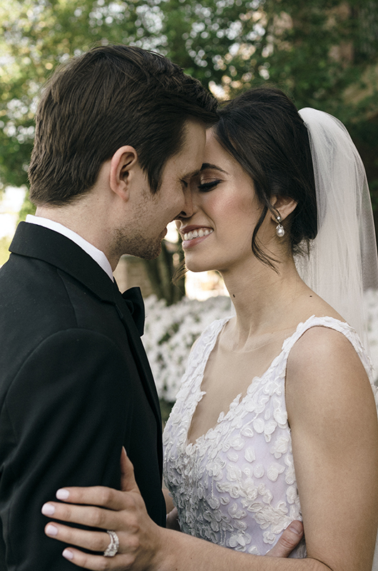 Claire Panebianco and Bobby Theobald Wedding in Houston Texas Standing Flowers Claire Bobby Theobold embrace