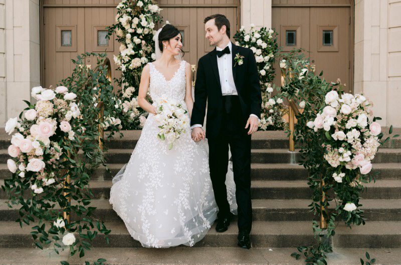 Claire Panebianco and Bobby Theobald Wedding in Houston Texas Couple Walking Stairs