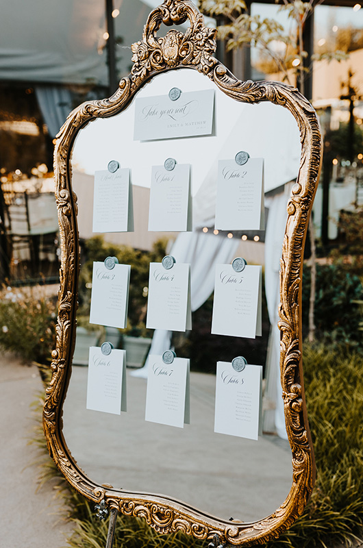 emily and matt marry in a classic church ceremony with a vintage reception seating chart