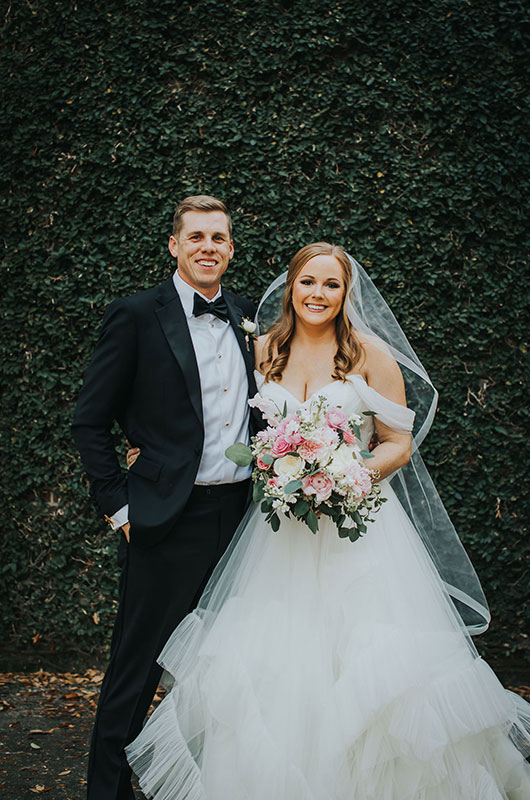 A Spring Wedding with a Blush Aesthetic Bride and Groom Portrait